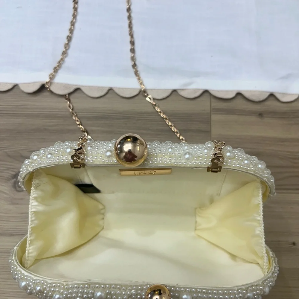 Elegant Pearl-Embellished Clutch